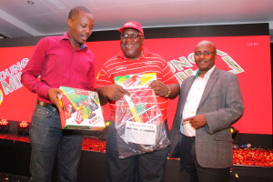 Mr Felix Kyengo, GOtv Kenya General Manager (right), Phillip Wahome, MultiChoice Kenya Corporate Communications Manager (left) and Charles Bukeko aka Papa Shirandula, GOtv brand ambassador and also popular Kenyan actor showcase the GOtv decoder package during the launch of GOtv’s ‘Dunga Milli’ promotion at Royal Orchid Hotel in Nairobi.