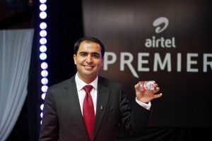 Airtel Kenya CEO Adil El Youssefi displays the Airtel Money Premier VISA card