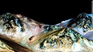 Liquid Water Exists on Mars. (Photo Courtesy of CNN)