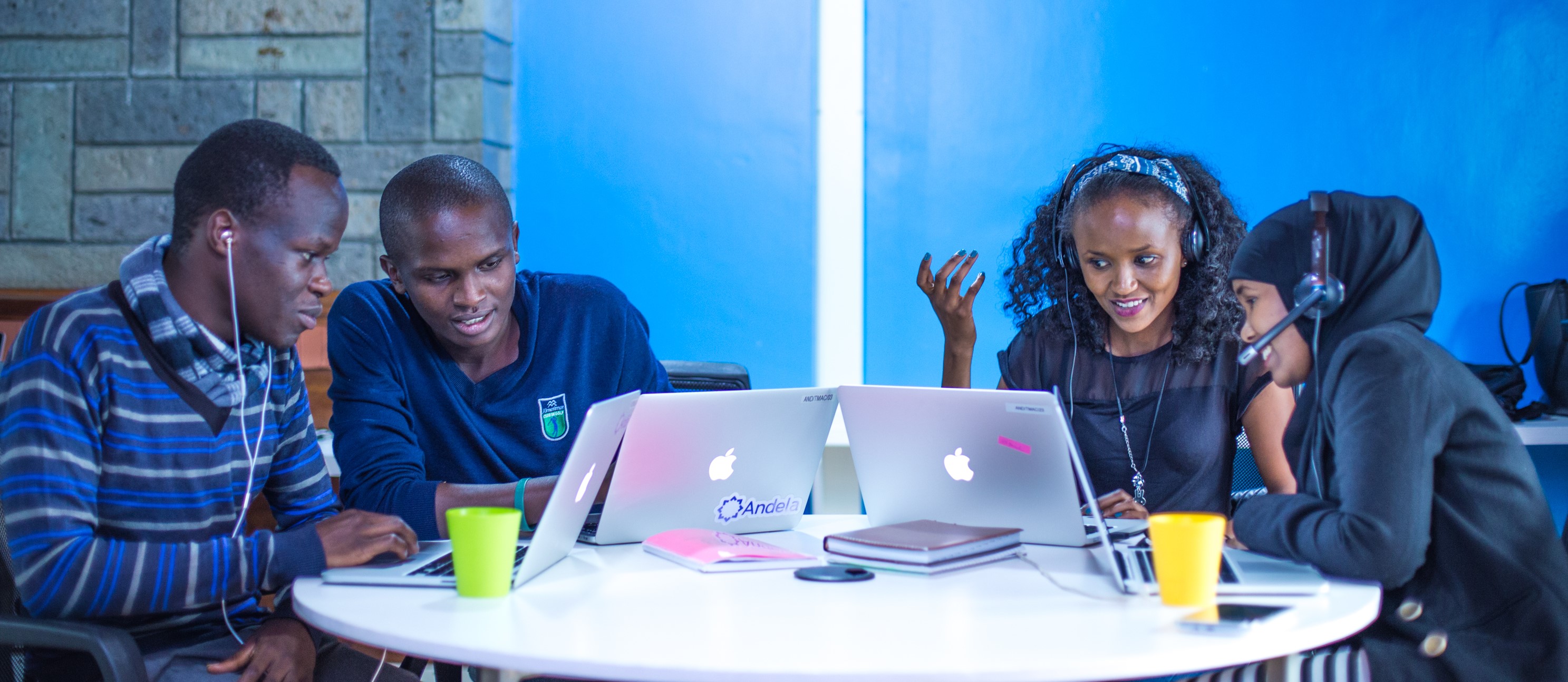 Group of Andela Developers Left to Right: Chris Ganga, John Kariuki, Penina Wanjiru and Suada Haji Nairobi, Kenya Photo Credit: Robert Opiyo