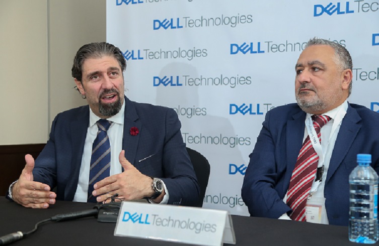 Nazih Moufarrej, Dell EMC Regional Senior Director (right) and Ken Kagota, Clients Solutions Specialist, Dell Kenya showcase various Dell products to Jerome Ochieng, Principal Secretary, Ministry of ICT during the Dell technologies regional conference held at Kempinski Hotel Nairobi.