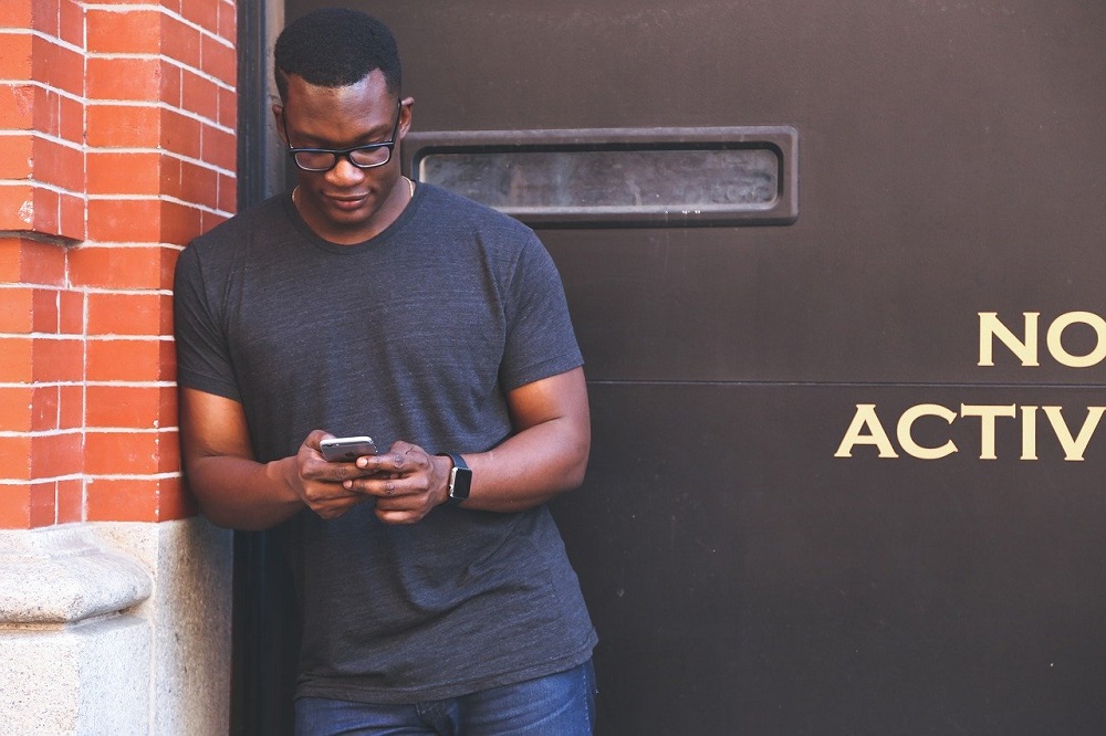 man using smartphone