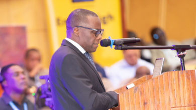 Chief Secretary Ambassador Moses Kusiluka speaks to senior officials at the 6th e-Government Annual Work Meeting in Arusha on February 17, 2026.