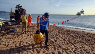 Engineers guide a subsea fiber cable ashore during a landing operation for the 2Africa network, part of the massive system designed to expand high-capacity internet connectivity across Africa, Europe, and Asia.