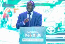 Stephen Isaboke, Principal Secretary for the State Department for Broadcasting and Telecommunications, speaks at Safaricom Decode 4.0, outlining an inclusive AI agenda built around access, shared infrastructure, and broad-based economic participation.