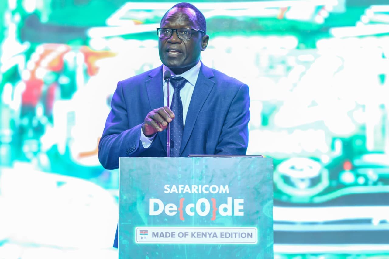 Stephen Isaboke, Principal Secretary for the State Department for Broadcasting and Telecommunications, speaks at Safaricom Decode 4.0, outlining an inclusive AI agenda built around access, shared infrastructure, and broad-based economic participation.