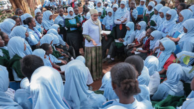 Iladho Galgallo speaks with students during a STEM mentorship session at Moi Girls High School Marsabit, encouraging girls to consider careers in technology and engineering.