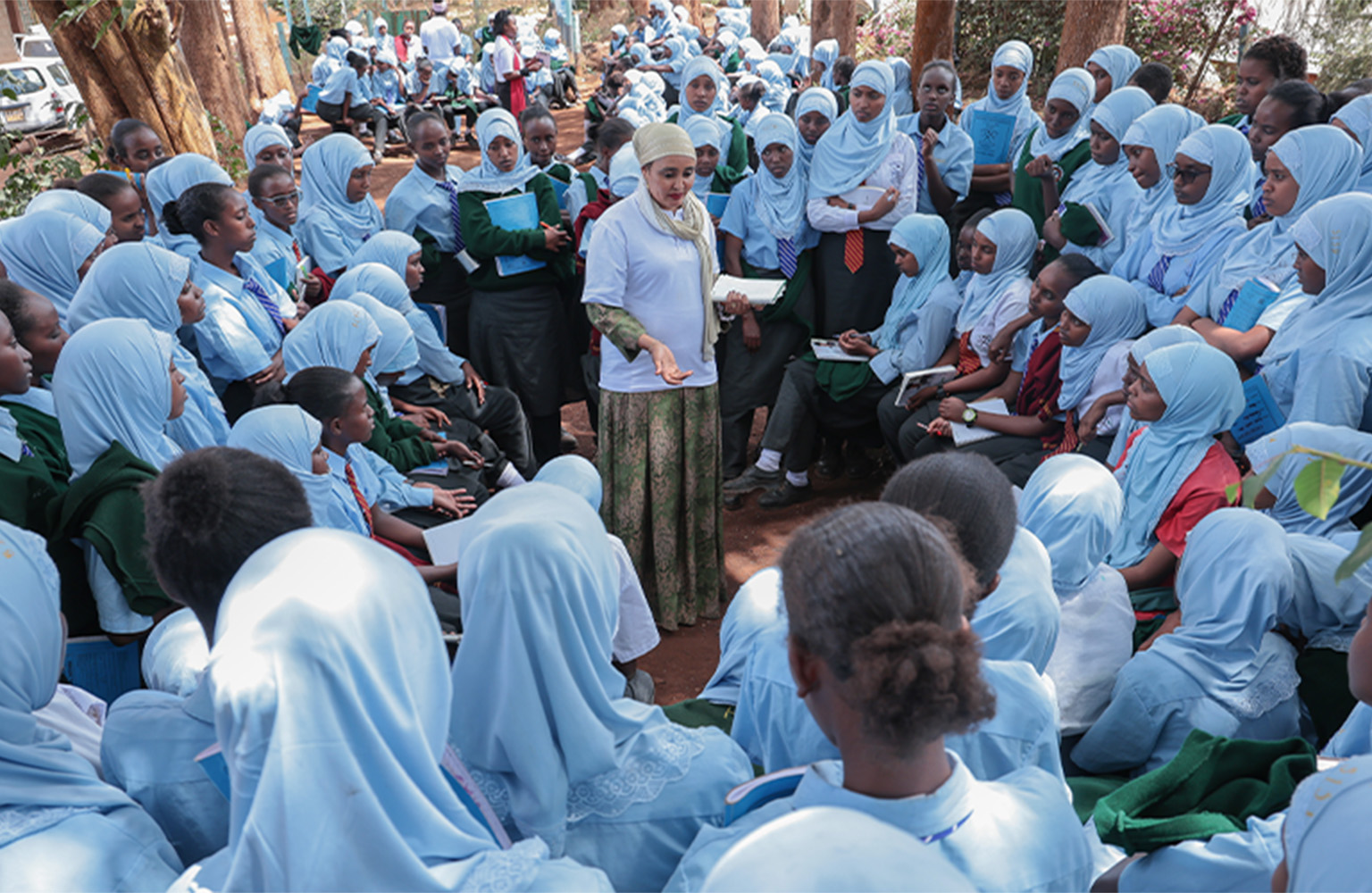 Iladho Galgallo speaks with students during a STEM mentorship session at Moi Girls High School Marsabit, encouraging girls to consider careers in technology and engineering.