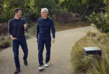 John Ternus (left) and Tim Cook walk together during a transition period that will see Ternus take over as CEO of Apple later this year.