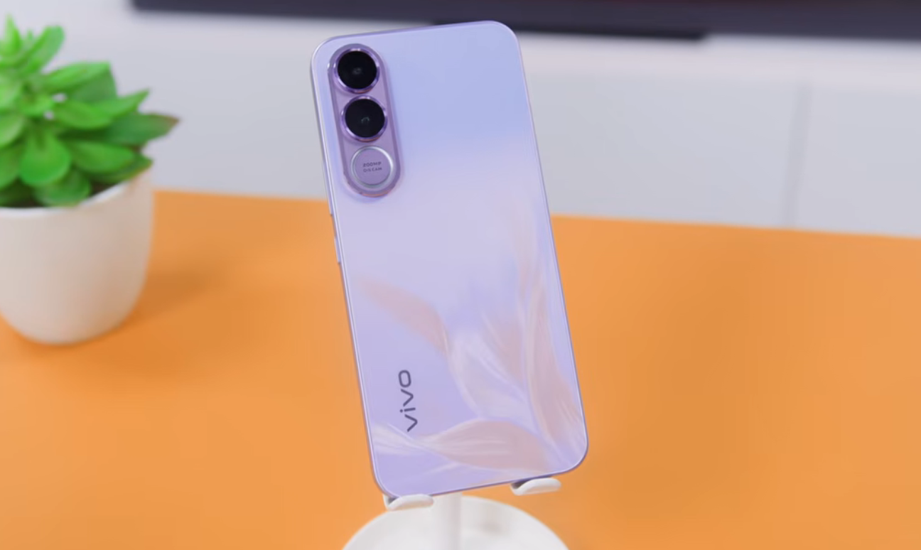 The Vivo V70 FE in a soft purple finish, showing its vertical dual-camera layout and minimalist rear design built around simplicity and balance.