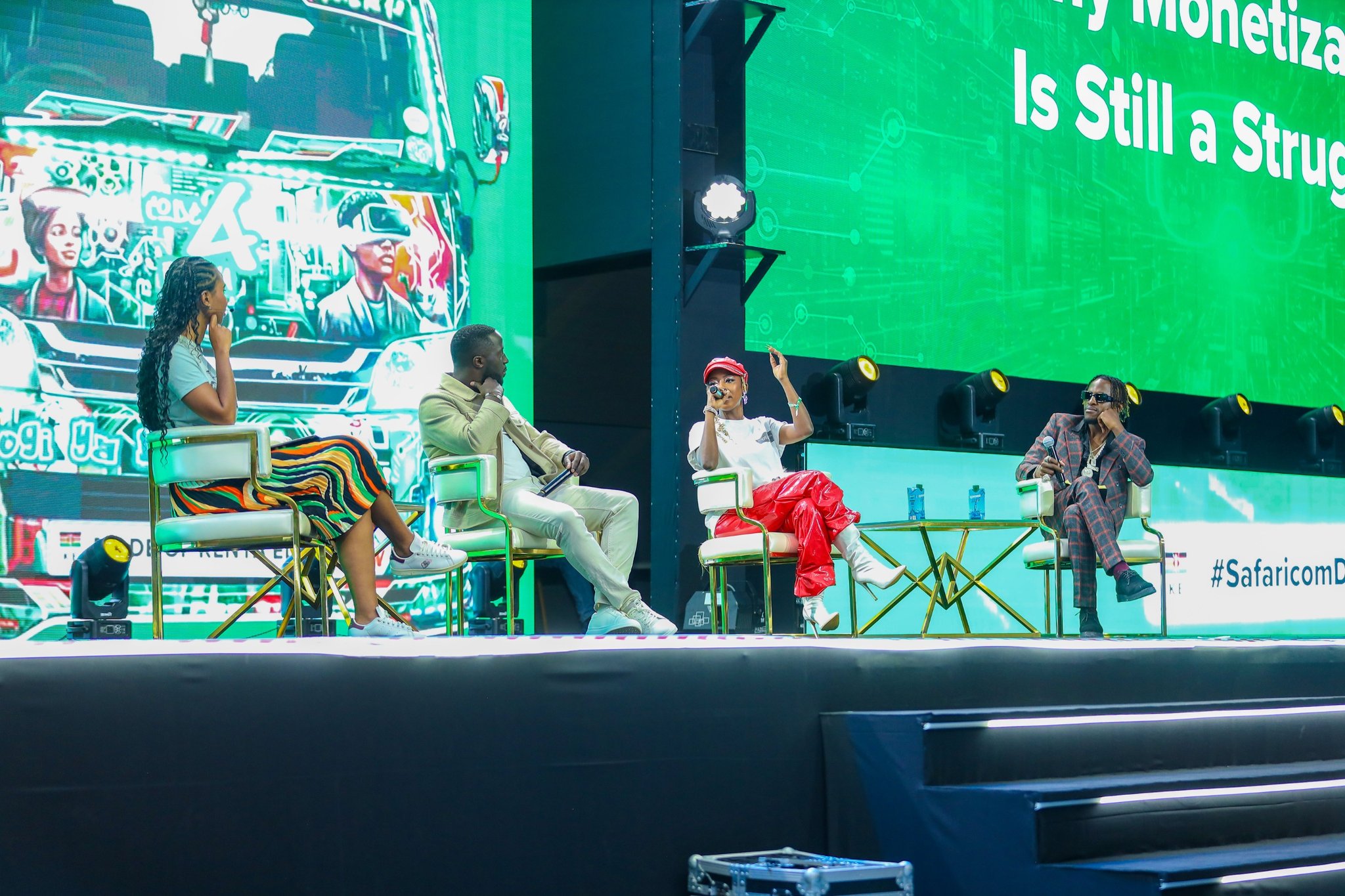 Artists Iyanii and Ssaru join Enos Olik and Cedo Kadenyi on stage at Safaricom Decode, where they led a practical discussion on content creation, monetization strategies, and building sustainable creative careers.