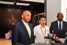 Kamal Budhabhatti, Founder of Craft Silicon; Chad Pollock, Vice President and General Manager for East Africa at Visa; and Johnson Ondicho, Head of Digital Channels at KCB, speak during the launch of TouristTap in Nairobi, as Kenya backs efforts to digitize tourism payments.