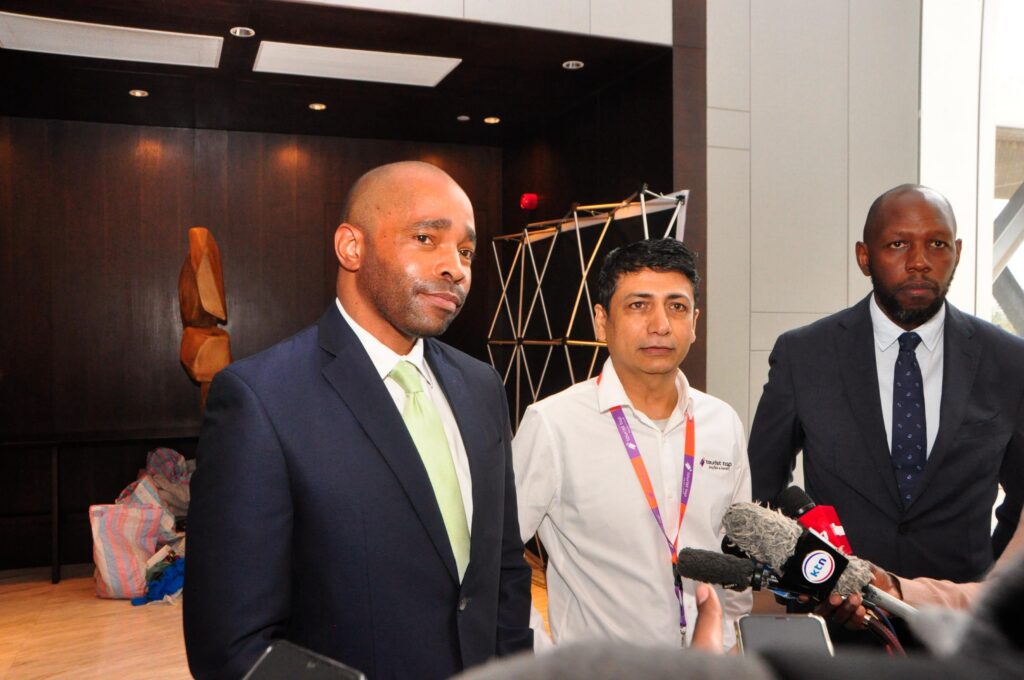 Kamal Budhabhatti, Founder of Craft Silicon; Chad Pollock, Vice President and General Manager for East Africa at Visa; and Johnson Ondicho, Head of Digital Channels at KCB, speak during the launch of TouristTap in Nairobi, as Kenya backs efforts to digitize tourism payments.