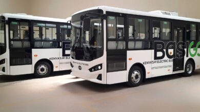 BasiGo electric buses parked at the company’s Nairobi facility as deployments expand across commuter routes in Kenya and Rwanda.