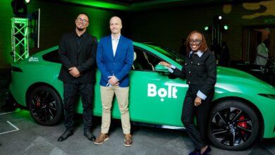 Bolt South Africa senior operations managers Simo Kalajdzic and Graham Walker stand with Bolt Regional Director for Rides Africa and International Markets Caroline Wanjihia during the company’s electric vehicle launch event in Cape Town.