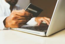 A customer uses a bank card to complete an online payment, reflecting the growing role of digital transactions in Kenya’s economy.