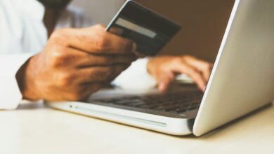 A customer uses a bank card to complete an online payment, reflecting the growing role of digital transactions in Kenya’s economy.