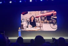 Google's Erin Pettigrew demonstrates Gemini Omni during Xiaomi's Vienna launch event, where the company showcased new AI-powered content creation tools alongside Leica-branded smartphone camera technology. The presentation highlighted the growing convergence of generative AI and mobile photography.