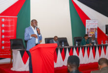 KRA Commissioner for Micro and Small Taxpayers George Obell speaks during a taxpayer engagement forum on digital tax compliance and mobile money transactions.