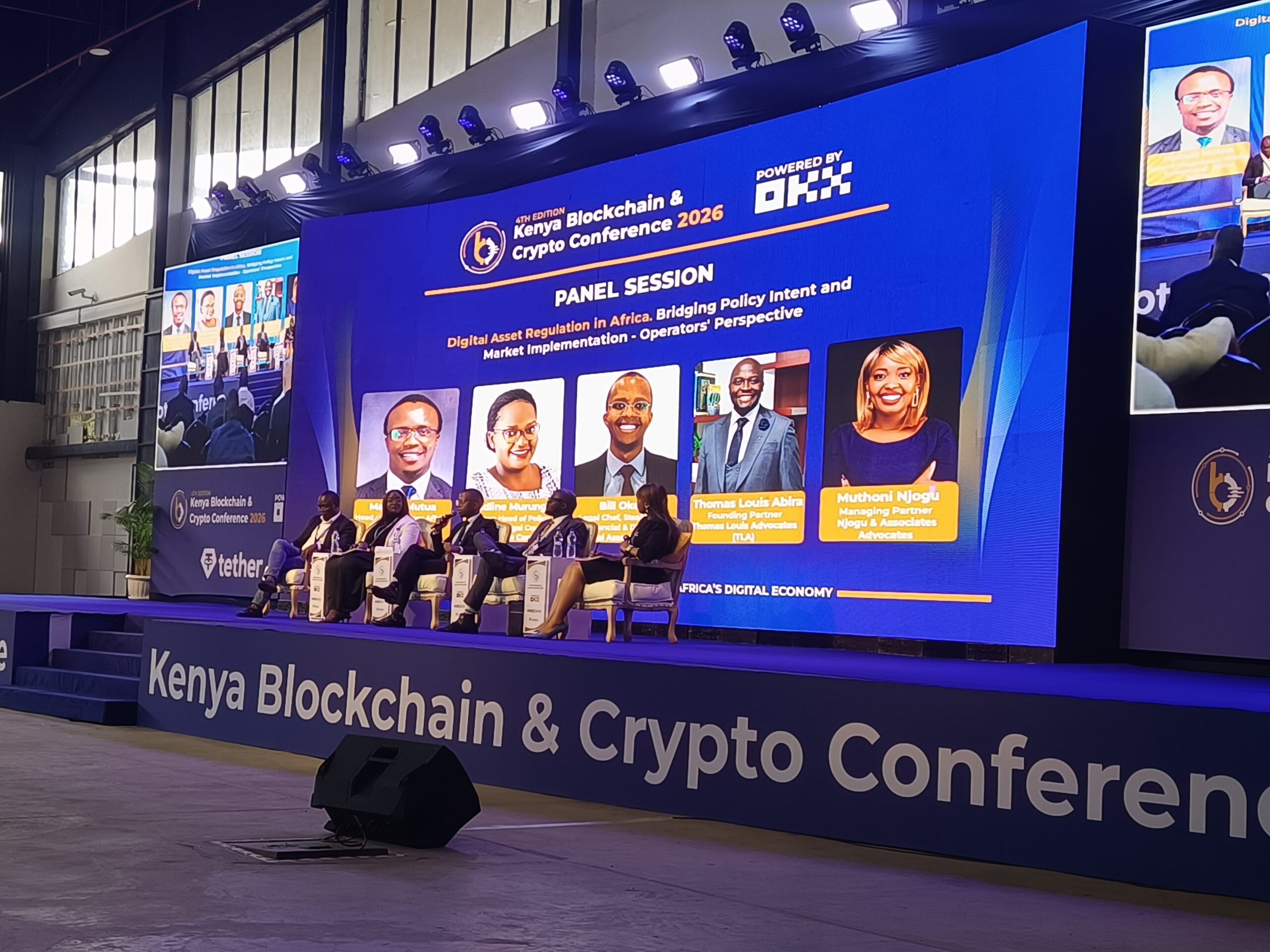 Panelists at the Kenya Blockchain & Crypto Conference 2026 during a session on digital asset regulation in Africa. From left are Mabuti Mutua, Head of Regulatory Affairs and Licensing Africa at Tether; Edline Murungi, Group Head of Policy and Senior Legal Counsel at Yellow Card; Bill Okello, Chief Legal Officer at Steakhouse Financial and Director at the Virtual Assets Chamber; Thomas Louis Abira, Founding Partner at Thomas Louis Advocates; and moderator Muthoni Njogu, Managing Partner at Njogu & Associates Advocates.