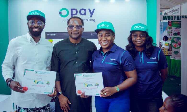 Representatives of OPay pose during an industry exhibition in Nigeria as the fintech company advances plans for a potential US public listing.