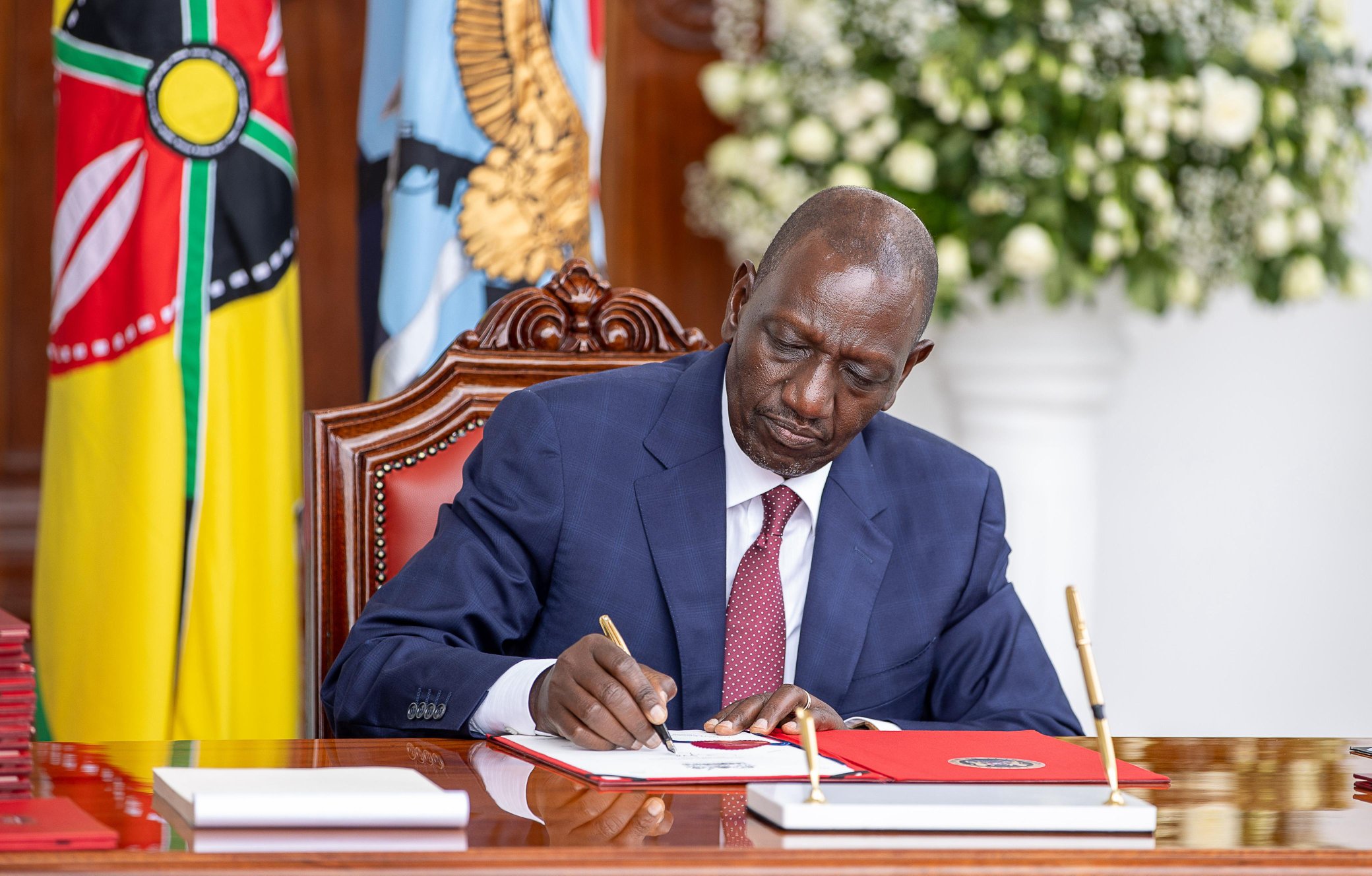 President William Ruto signs the Income Tax Bill, Special Economic Zones Amendment Bill and Technopolis Bill at State House, Nairob