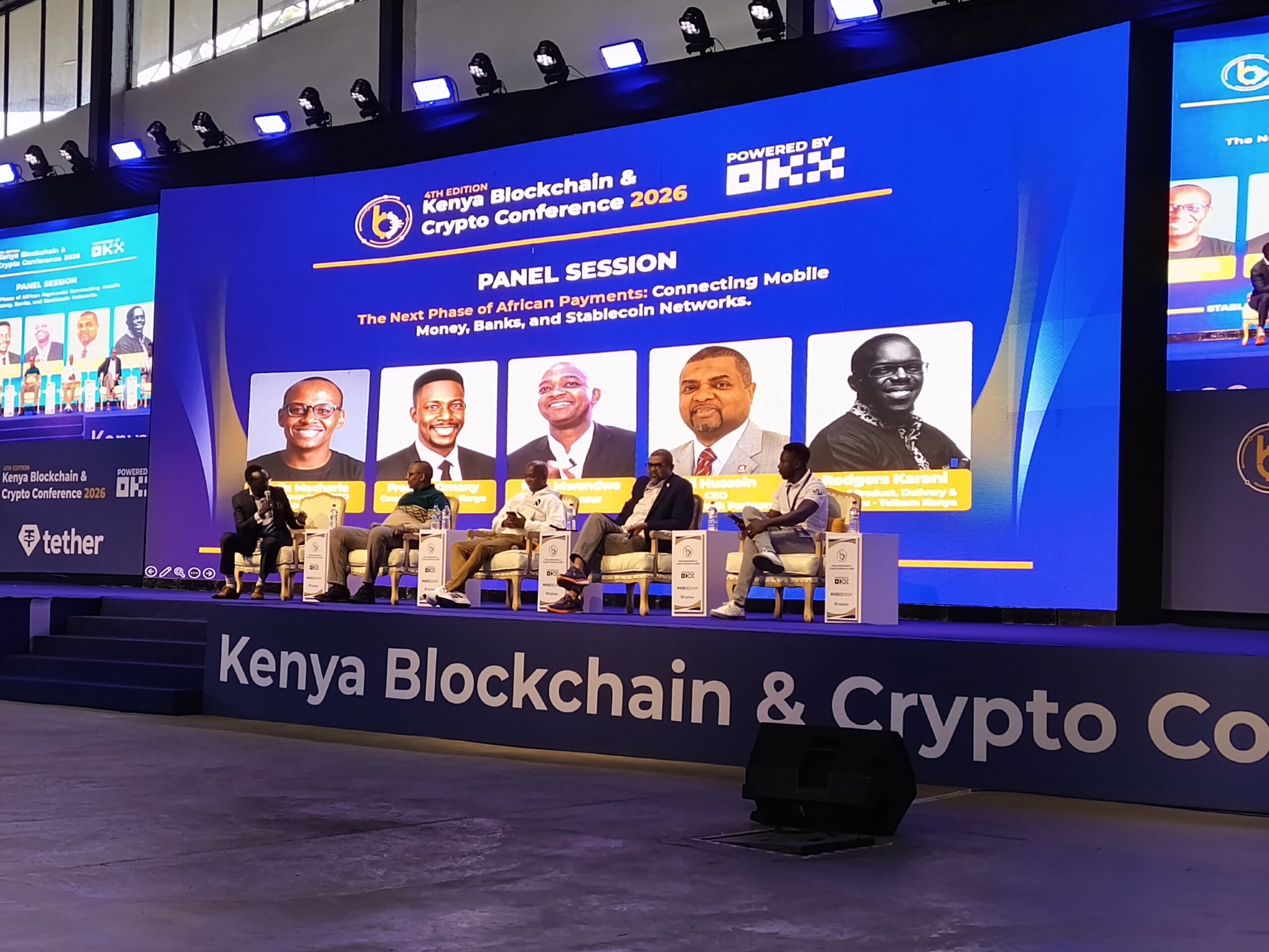 Moderator Rogers Karani of T-kash joins Freddie Omany of Pawapay, Felix Macharia of Kotani Pay, techpreneur Nick Mwendwa and Ali Hussein of AHK Growth Partners during a panel on mobile money, banking infrastructure and stablecoin networks at the Kenya Blockchain & Crypto Conference 2026 in Nairobi.