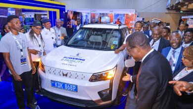 Kenya Power-branded Mahindra XUV400 electric SUV displayed at an e-mobility exhibition in Kenya, highlighting the country's growing electric vehicle market and charging infrastructure.