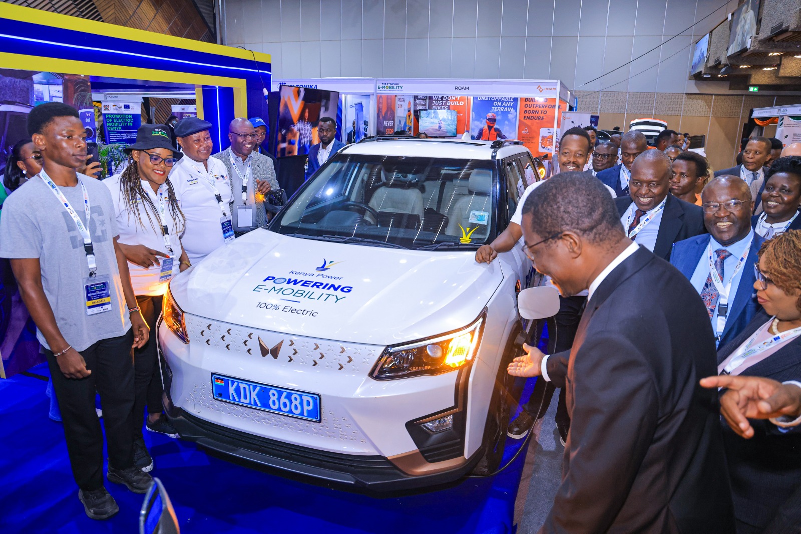 Kenya Power-branded Mahindra XUV400 electric SUV displayed at an e-mobility exhibition in Kenya, highlighting the country's growing electric vehicle market and charging infrastructure.