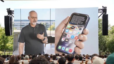 Mike Rockwell presents Apple's new Siri AI features on a large screen during WWDC 2026 as attendees watch from the audience.