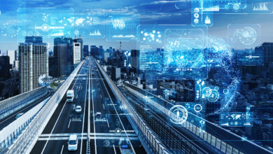 Digital overlay of smart traffic technology and data systems above an urban highway, illustrating intelligent transport infrastructure and connected mobility networks.