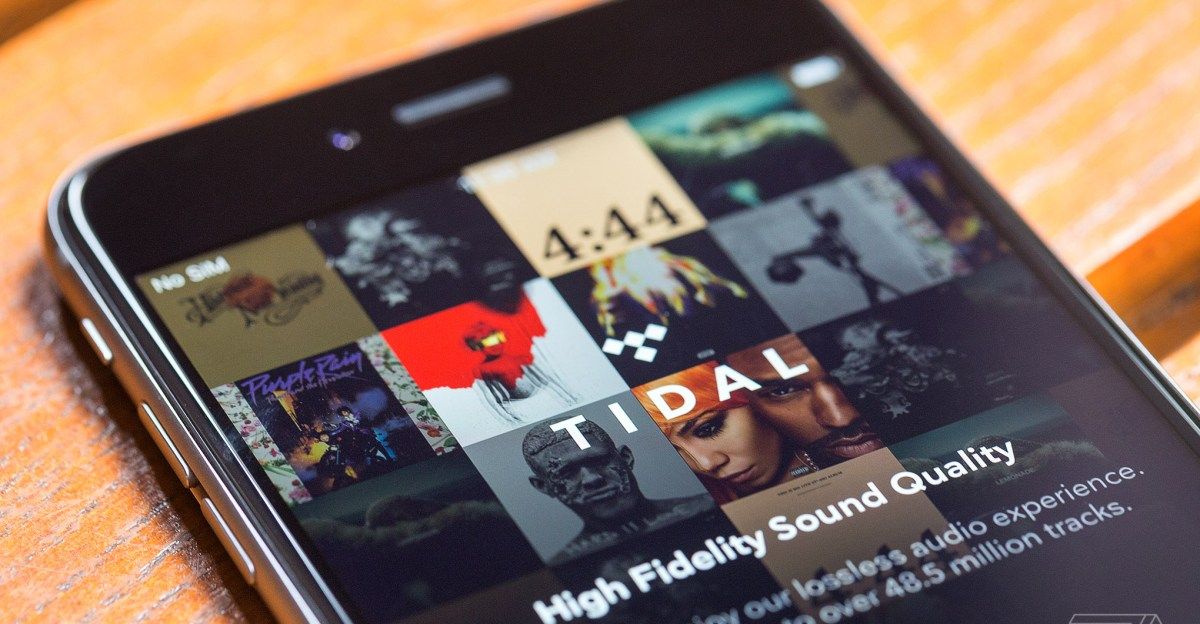 A smartphone displaying the TIDAL music streaming app as the platform rolls out artist-controlled AI-generated music royalty settings.