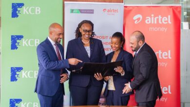 KCB Bank and Airtel Money executives during the signing of a partnership that allows Airtel Money customers to deposit and withdraw cash at over 22,000 KCB agents in Kenya.