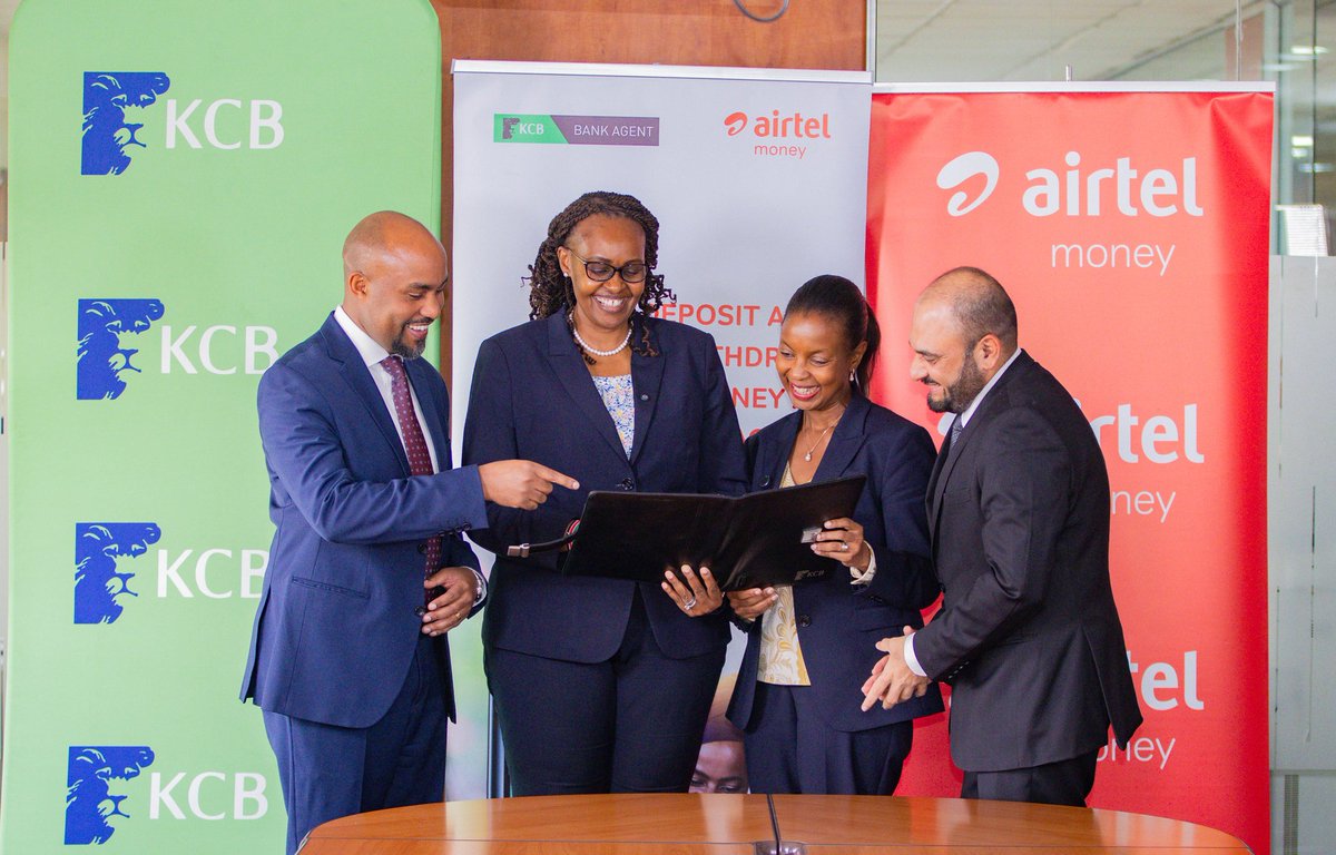 KCB Bank and Airtel Money executives during the signing of a partnership that allows Airtel Money customers to deposit and withdraw cash at over 22,000 KCB agents in Kenya.
