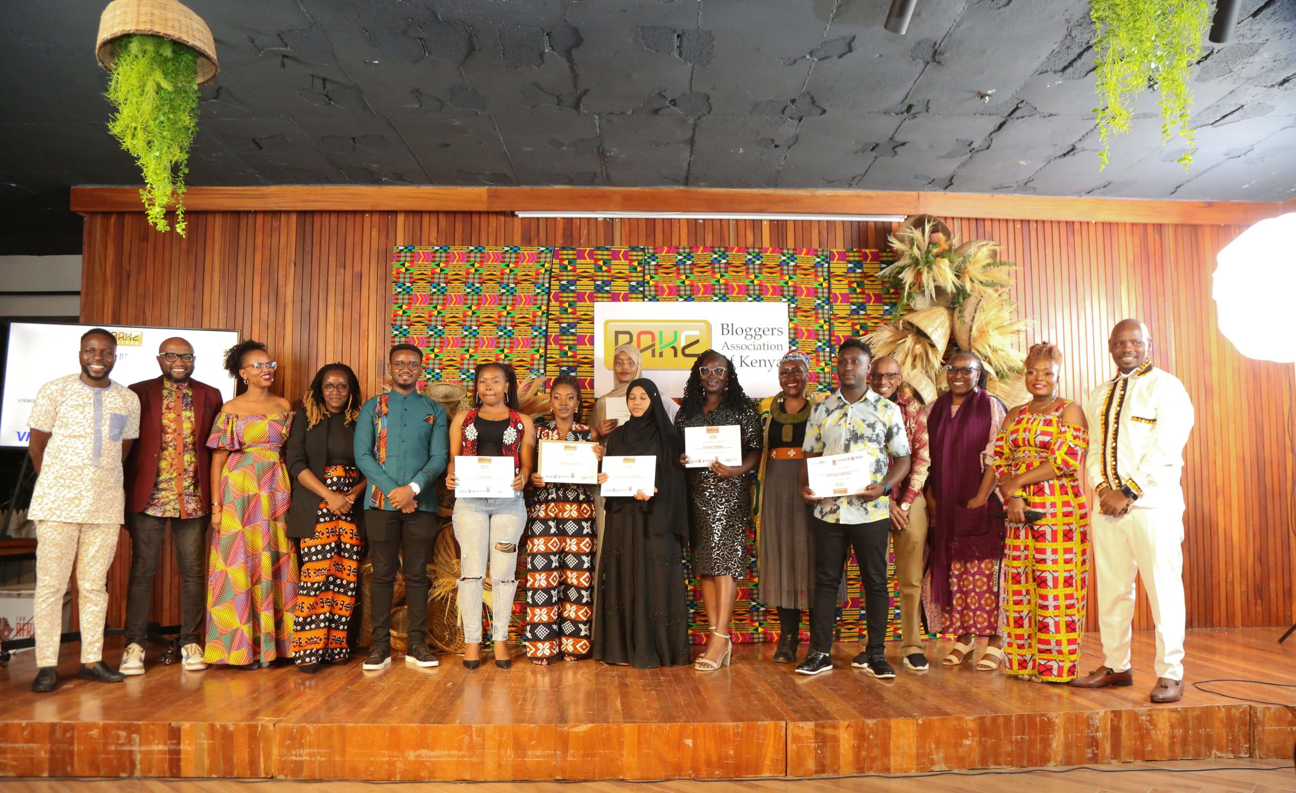 Some of the winners at the 10th BAKE Awards pose with their certificates on stage at Baraza Media Lab in Nairobi.
