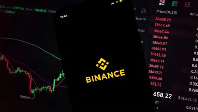 The Binance mobile app displayed against a cryptocurrency trading interface. The exchange is expanding into U.S. stock trading while preparing a tokenized equities offering for global users.