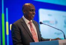 David Mugonyi, Director General and CEO of the Communications Authority of Kenya, speaks at the Africa Internet Summit 2026 opening ceremony in Nairobi.