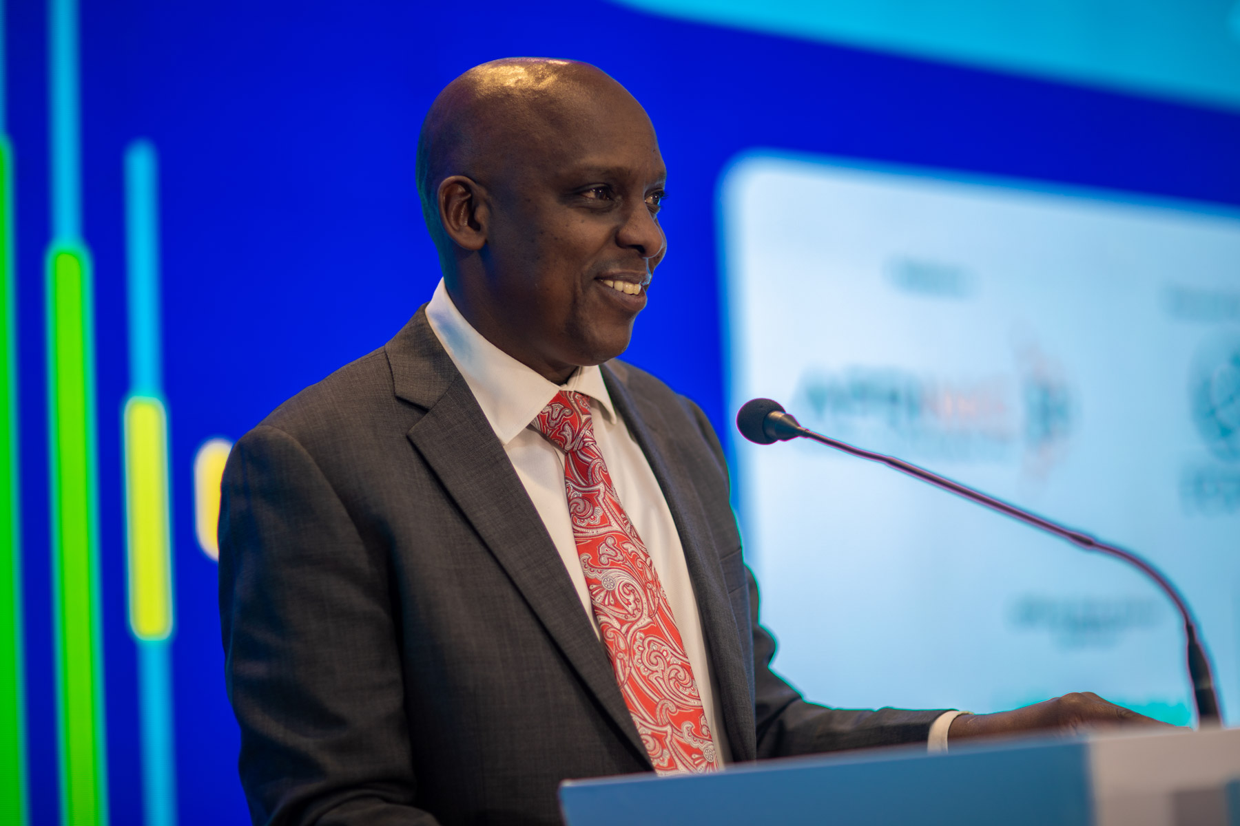 David Mugonyi, Director General and CEO of the Communications Authority of Kenya, speaks at the Africa Internet Summit 2026 opening ceremony in Nairobi.