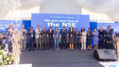 Family Bank executives, NSE officials, transaction advisors and board members celebrate the lender's admission to the Nairobi Securities Exchange during a listing ceremony in Nairobi.