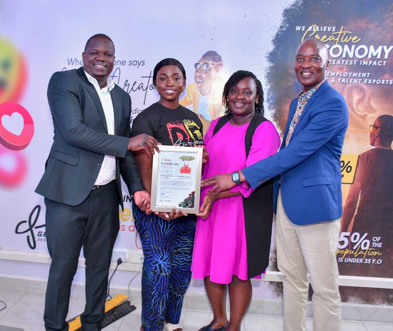 Officials present a certificate to a participant during the Jitume Digital Media Tools Sensitization Workshop graduation in Nairobi, recognizing digital media and AI skills training.