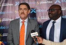 Kibo Africa Director Felix Mulwa and Powerhive CEO Chris Hornor at the launch of Kibo Spark electric motorcycles in Nairobi, Kenya.