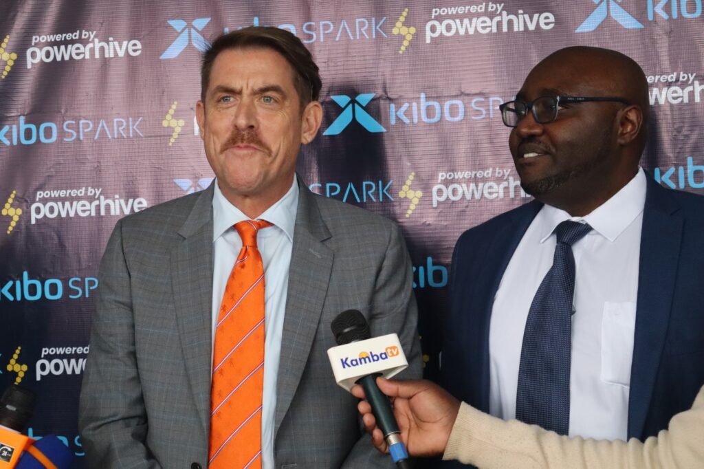 Kibo Africa Director Felix Mulwa and Powerhive CEO Chris Hornor at the launch of Kibo Spark electric motorcycles in Nairobi, Kenya.