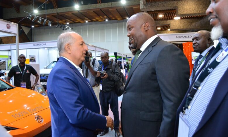 Simba Corp executives present MG electric vehicles to Energy Principal Secretary Alex Wachira at the E-Mobility Stakeholders Conference in Nairobi.