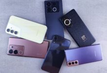 Several smartphones arranged on a surface, illustrating Kenya's debate over proposed mobile phone tax changes under the Finance Bill 2026.