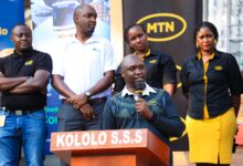 Ibrahim Senyonga, General Manager of MTN Uganda's Enterprise Business Unit, addresses attendees during the launch of Cashless School Days, a new smart wristband-powered transport solution for students.