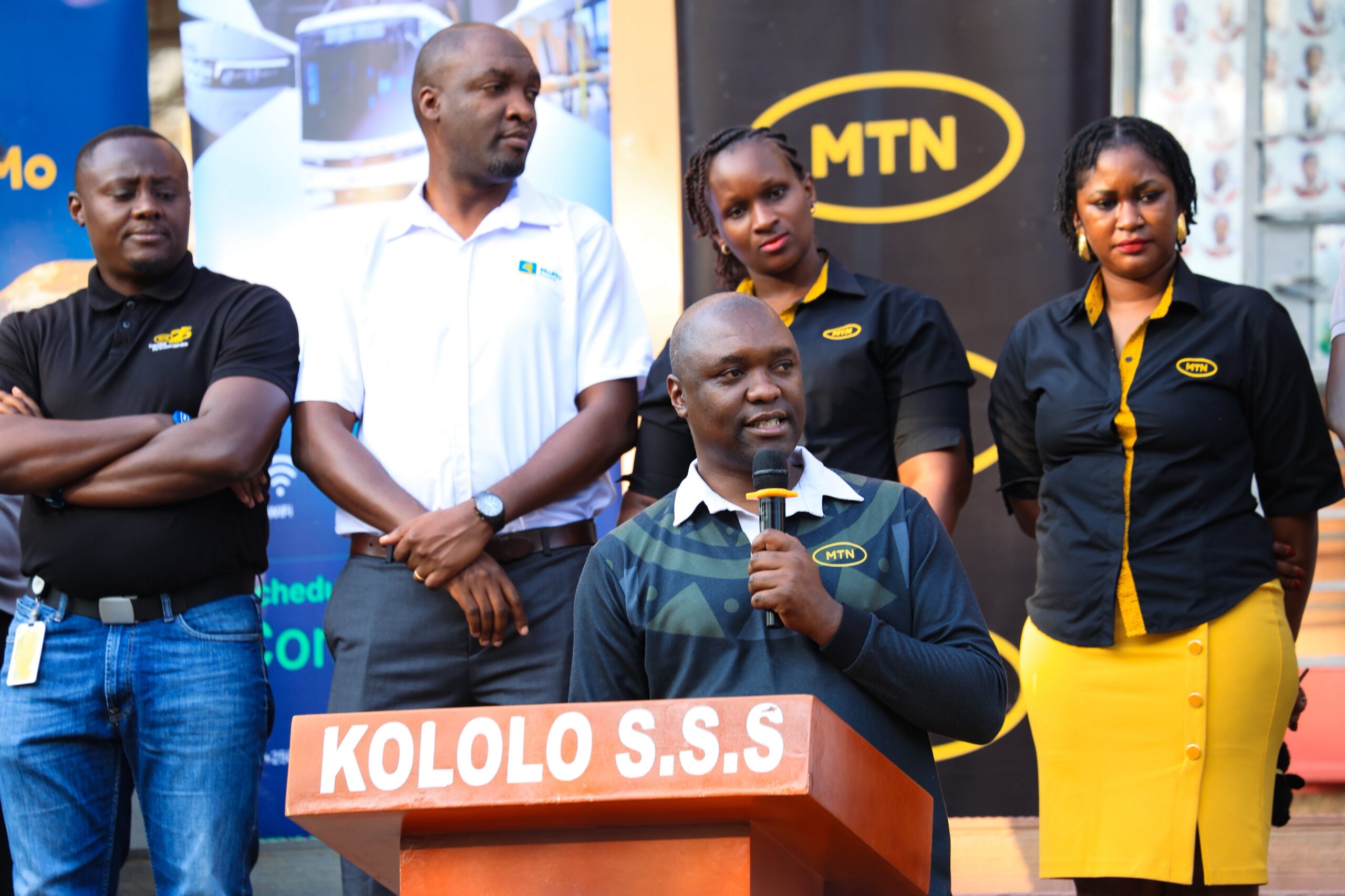 Ibrahim Senyonga, General Manager of MTN Uganda's Enterprise Business Unit, addresses attendees during the launch of Cashless School Days, a new smart wristband-powered transport solution for students.