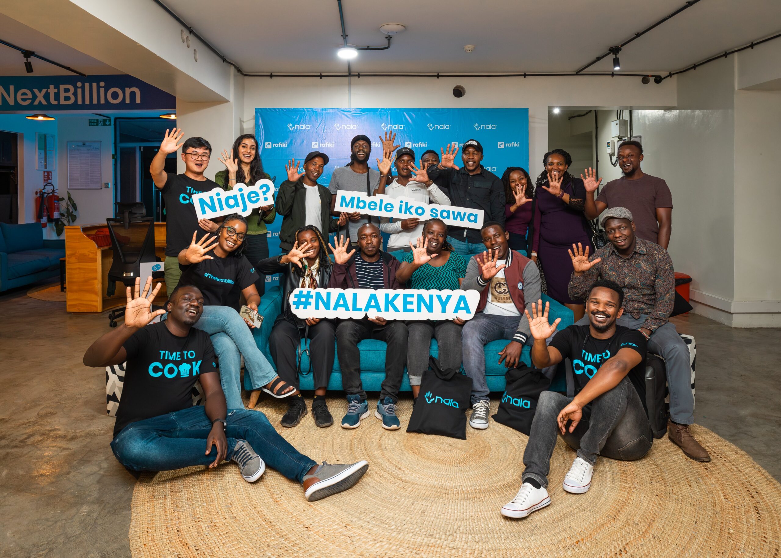 Nala team members and community participants pose for a group photo during a Kenya event in Nairobi.