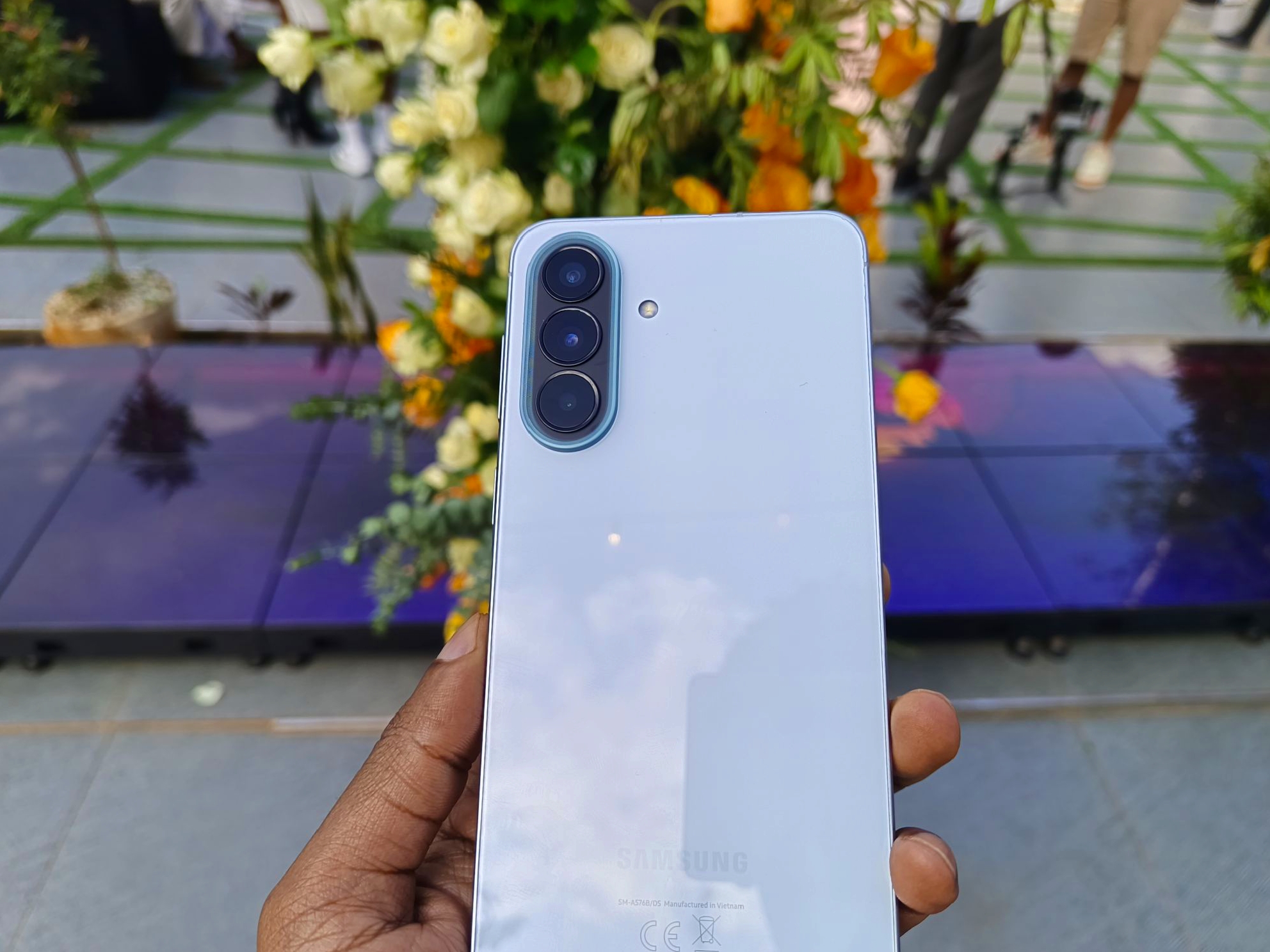 Samsung Galaxy A57 5G photographed during the Galaxy Hangout creator event in Nairobi, showcasing Samsung's AI-focused A-series smartphone lineup.