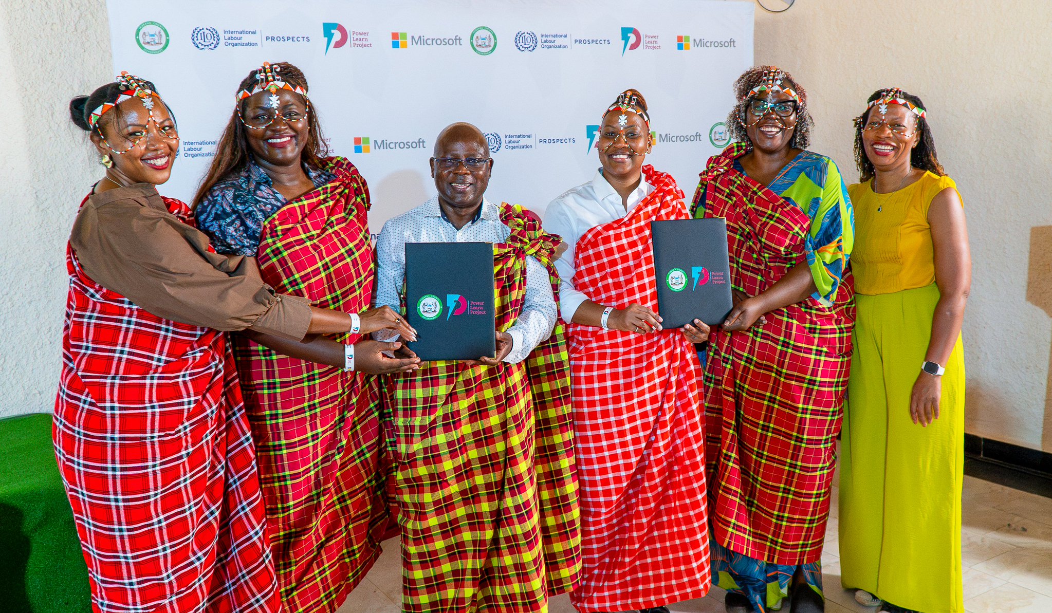 Representatives from ILO, Microsoft, Power Learn Project Africa and the Turkana County Government launch a digital skills programme for refugee and host community youth in Kenya.