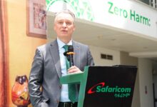 Safaricom Ethiopia CEO Wim Vanhelleputte speaking at a podium during a company event.